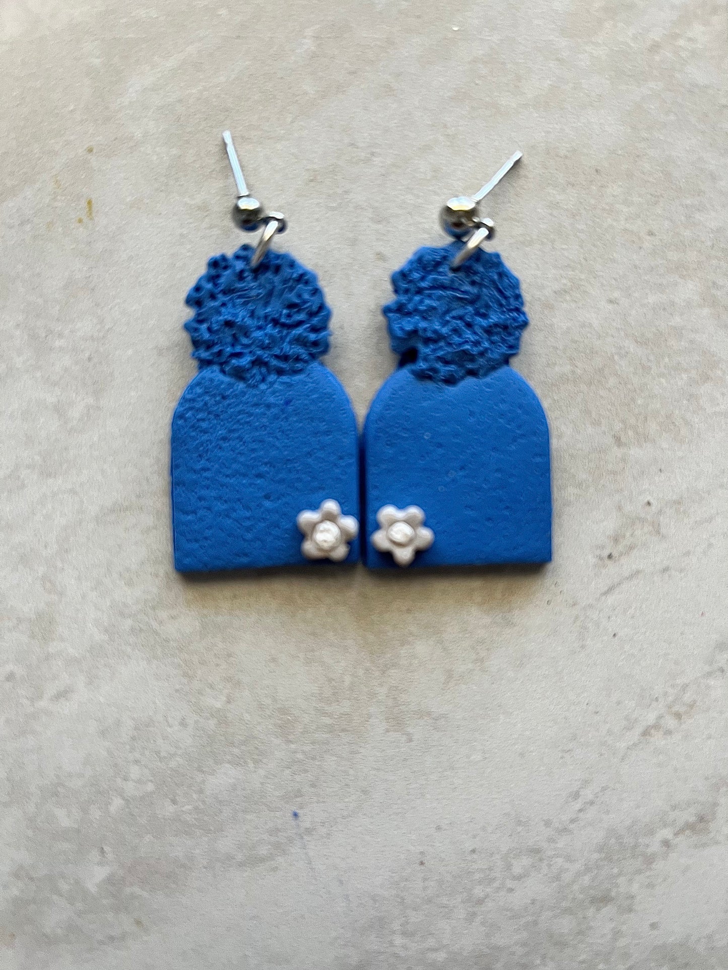 Flower embellished hats Earrings 1955