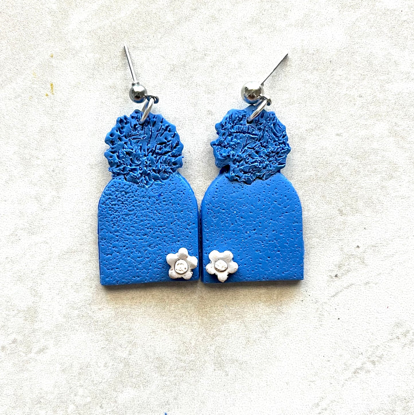 Flower embellished hats Earrings 1955